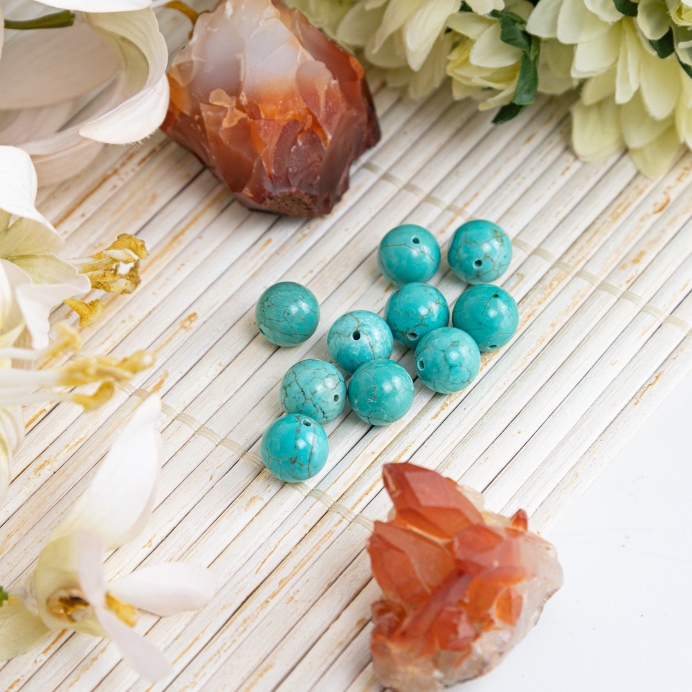 turquoise beads with red gemstones