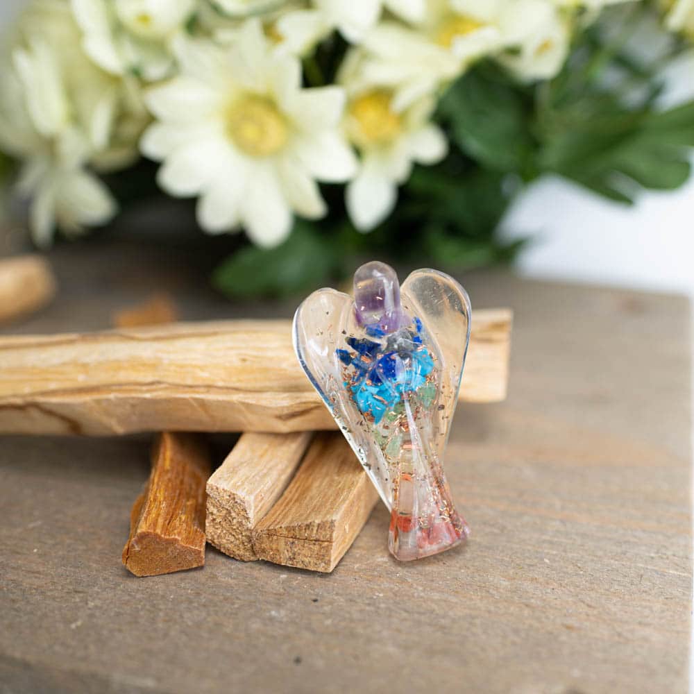 orgonite statue rainbow chakra angel with palo santo