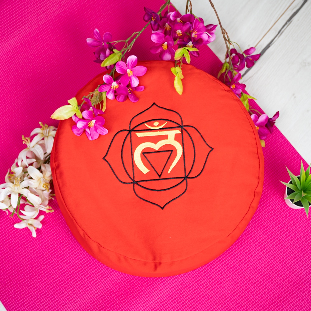 root chakra symbol red meditation cushion