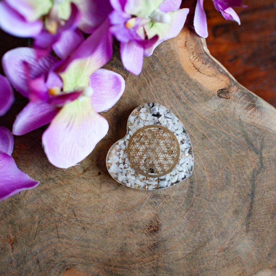 white orgonite heart flower of life