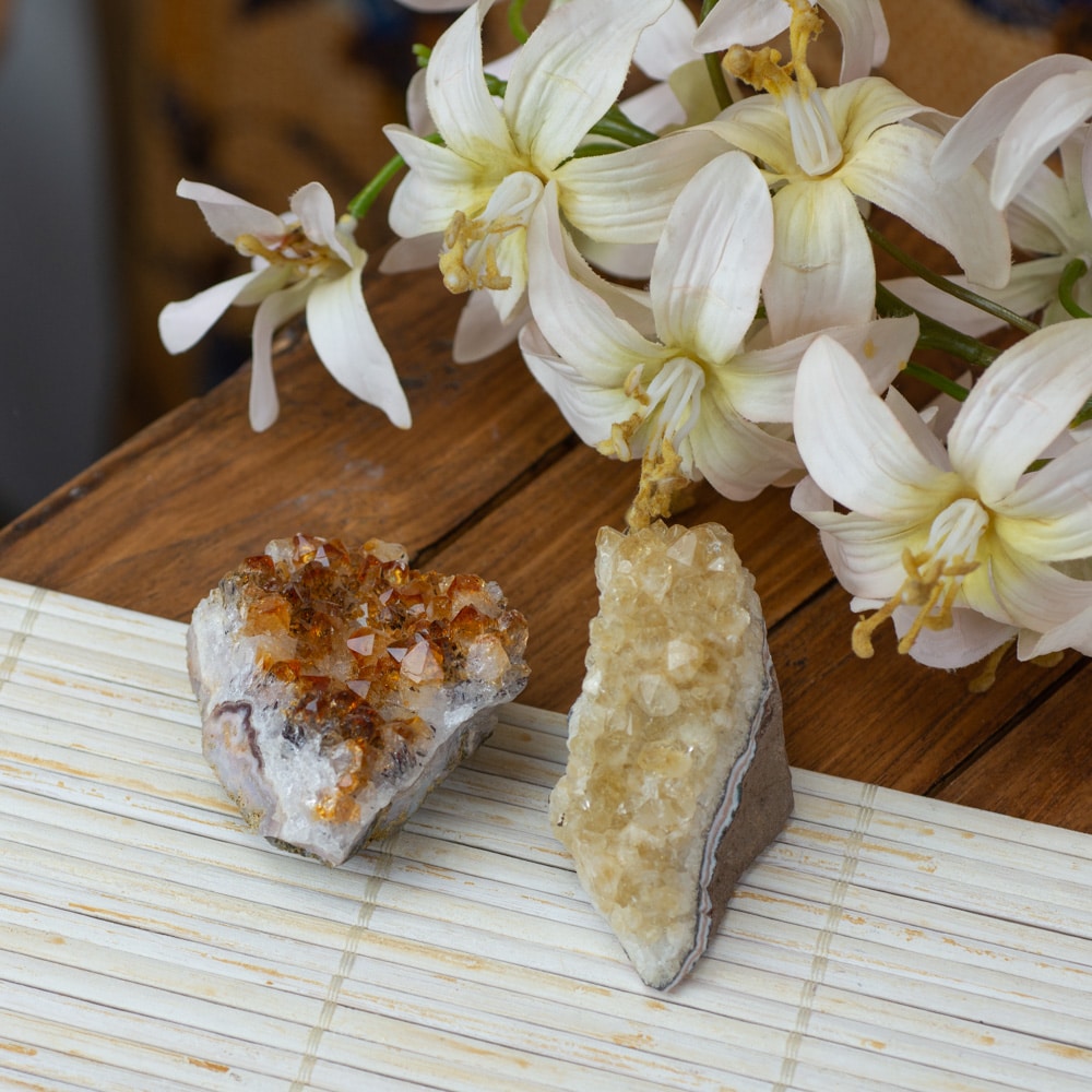 citrine gemstone clusters on table