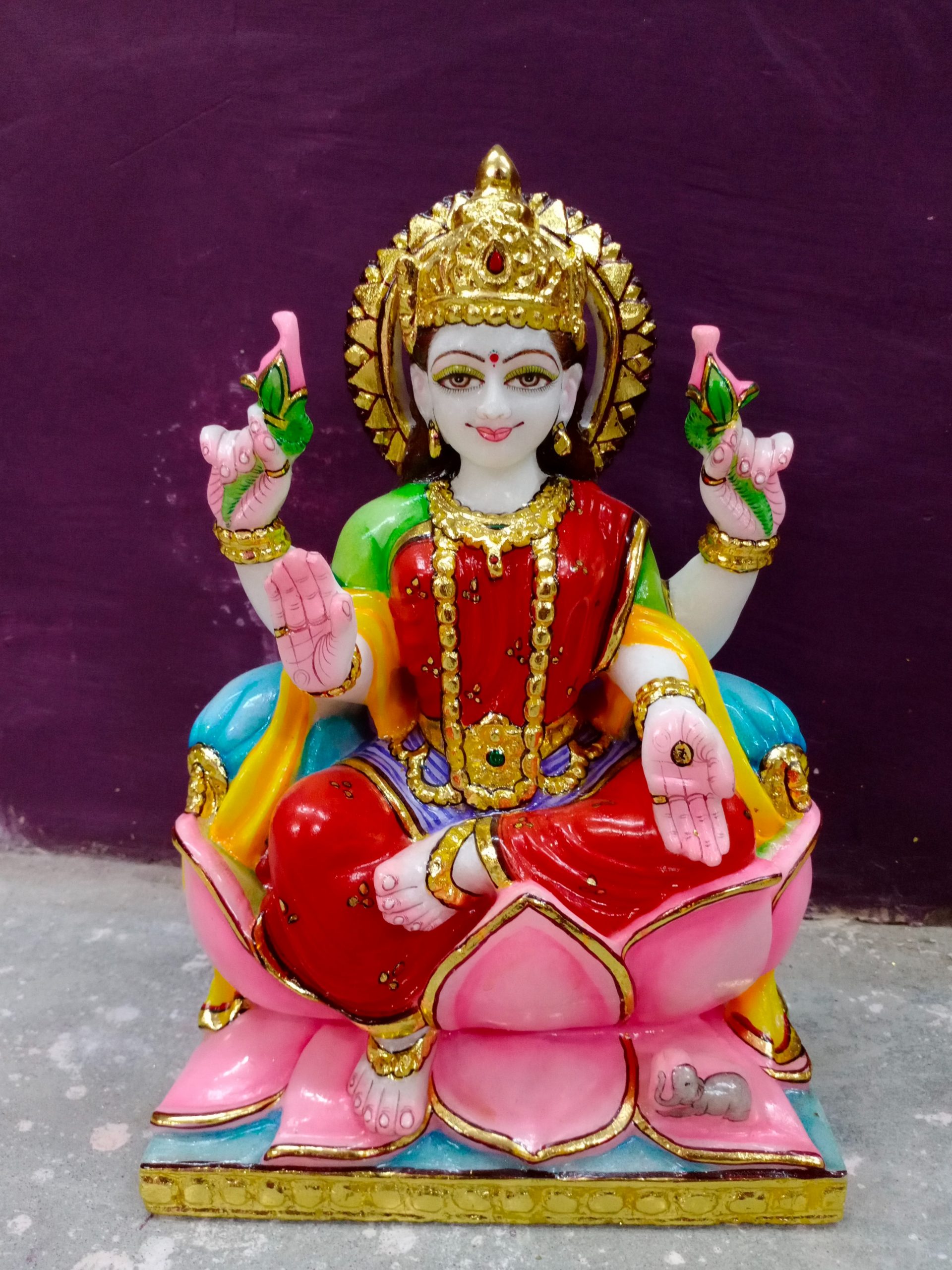 lakshmi seated in a lotus