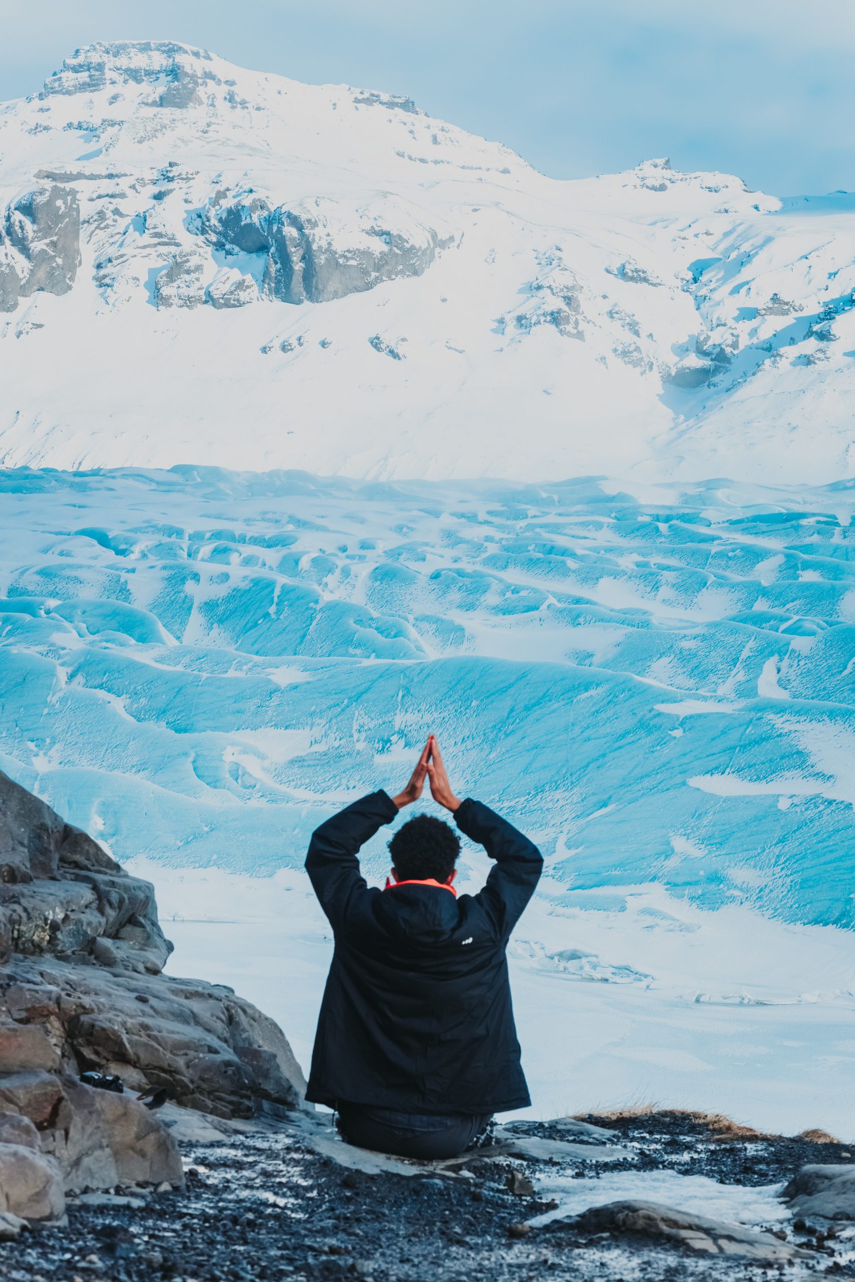 namaste hands in mountains