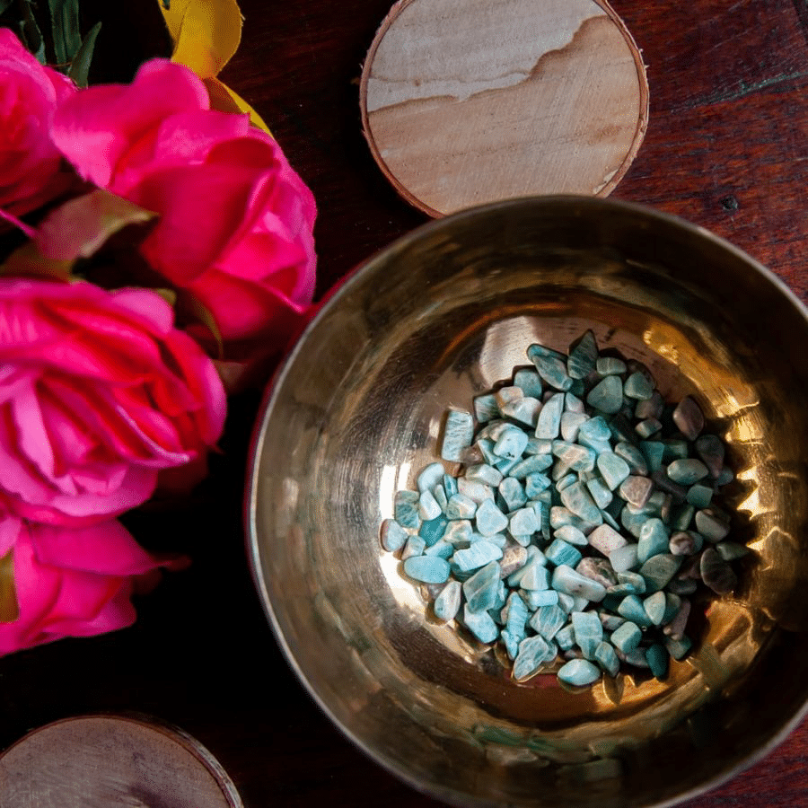 raw aquamarine in an offering dish