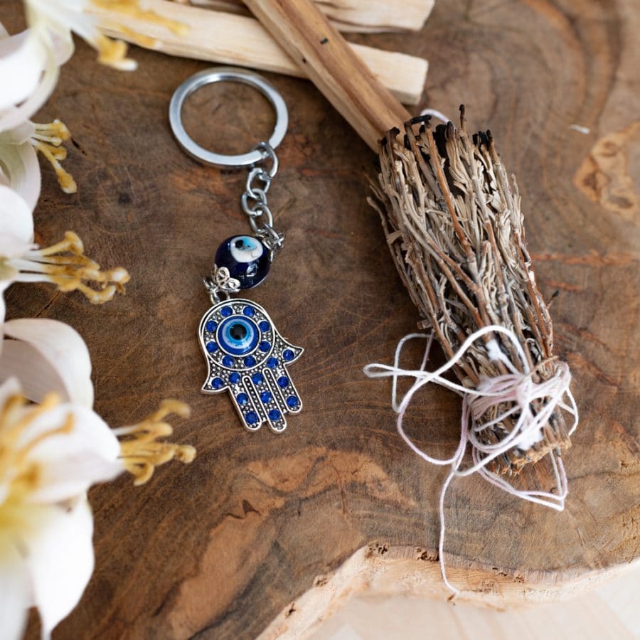 evil eye hamsa hand keychain with white sage and palo santo