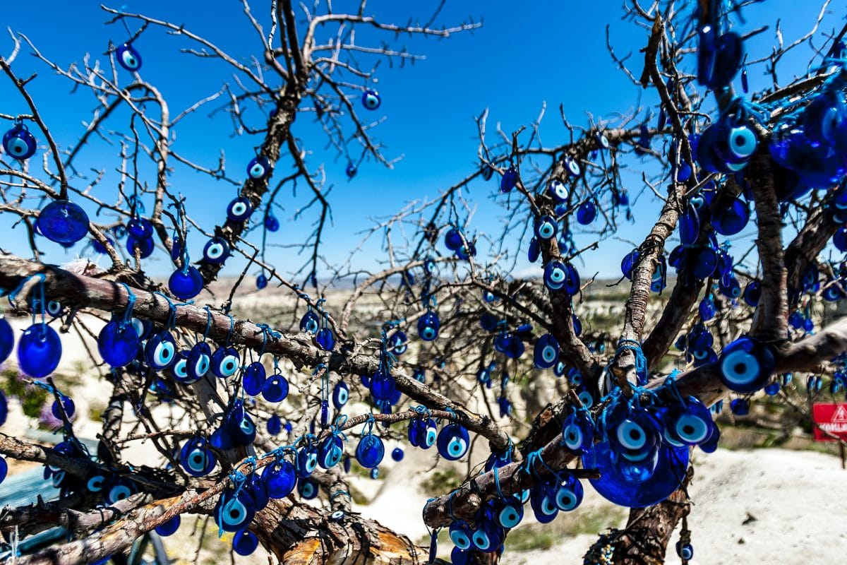 many nazar bncugu evil eye glass beads in tree