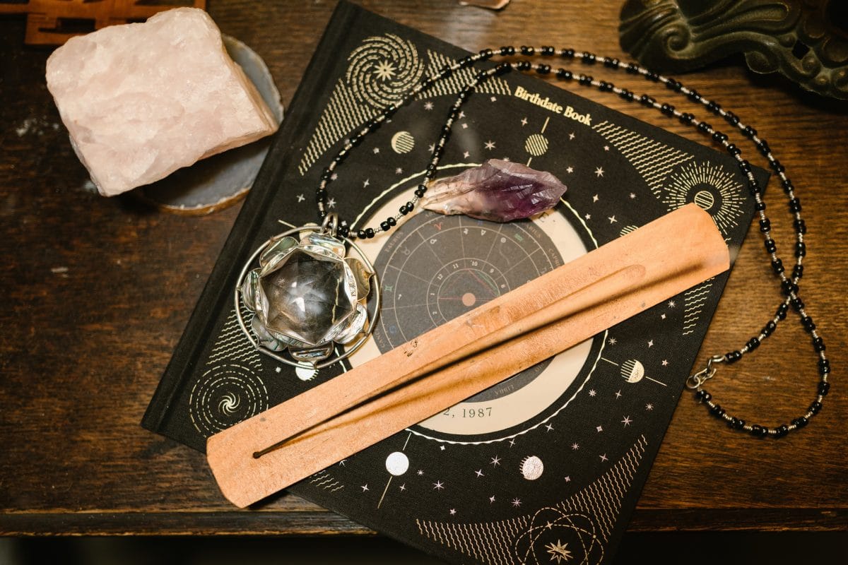 zodiac map with incense and crystals