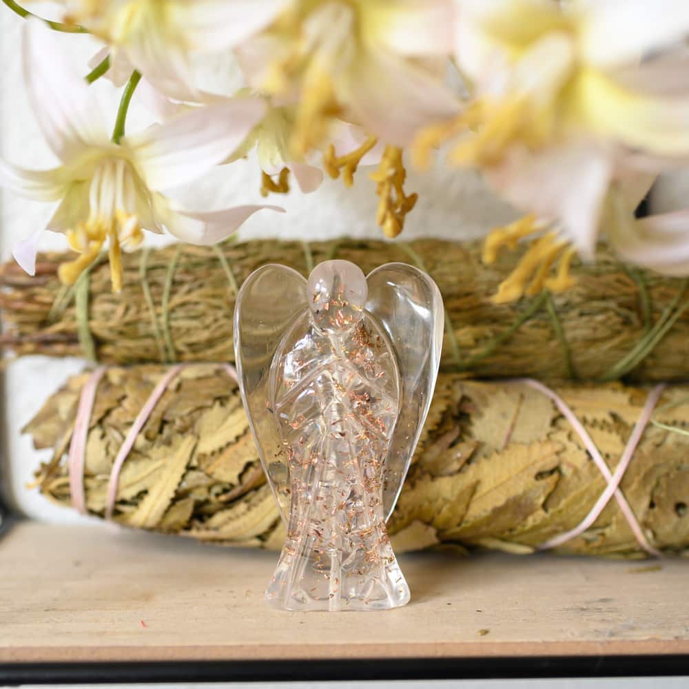 orgonite gemstone angel statue with white sage smudge