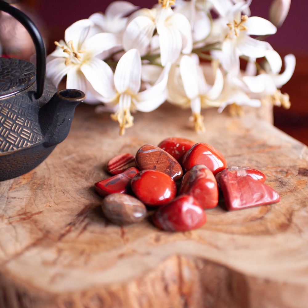 red jasper tumbled stones with white flowers