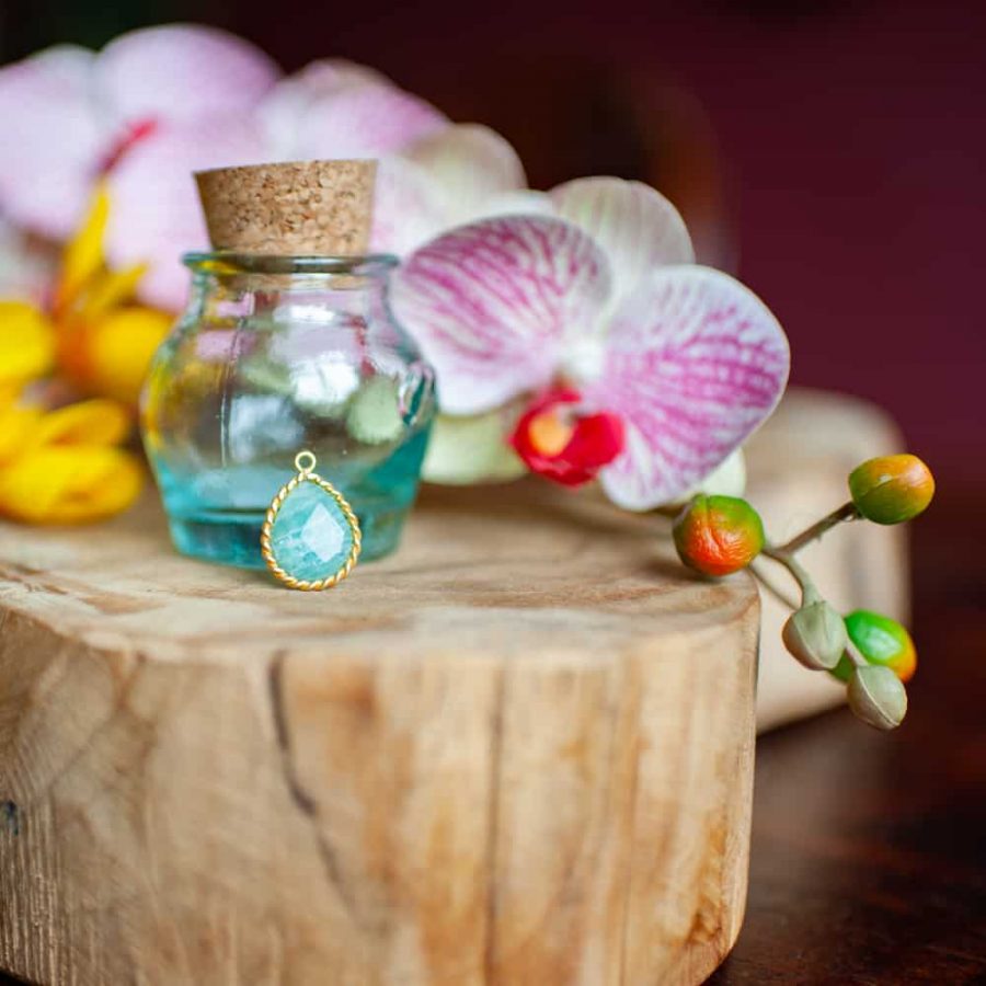 5th chakra amazonite pendant with turquoise glass bottle and orchid