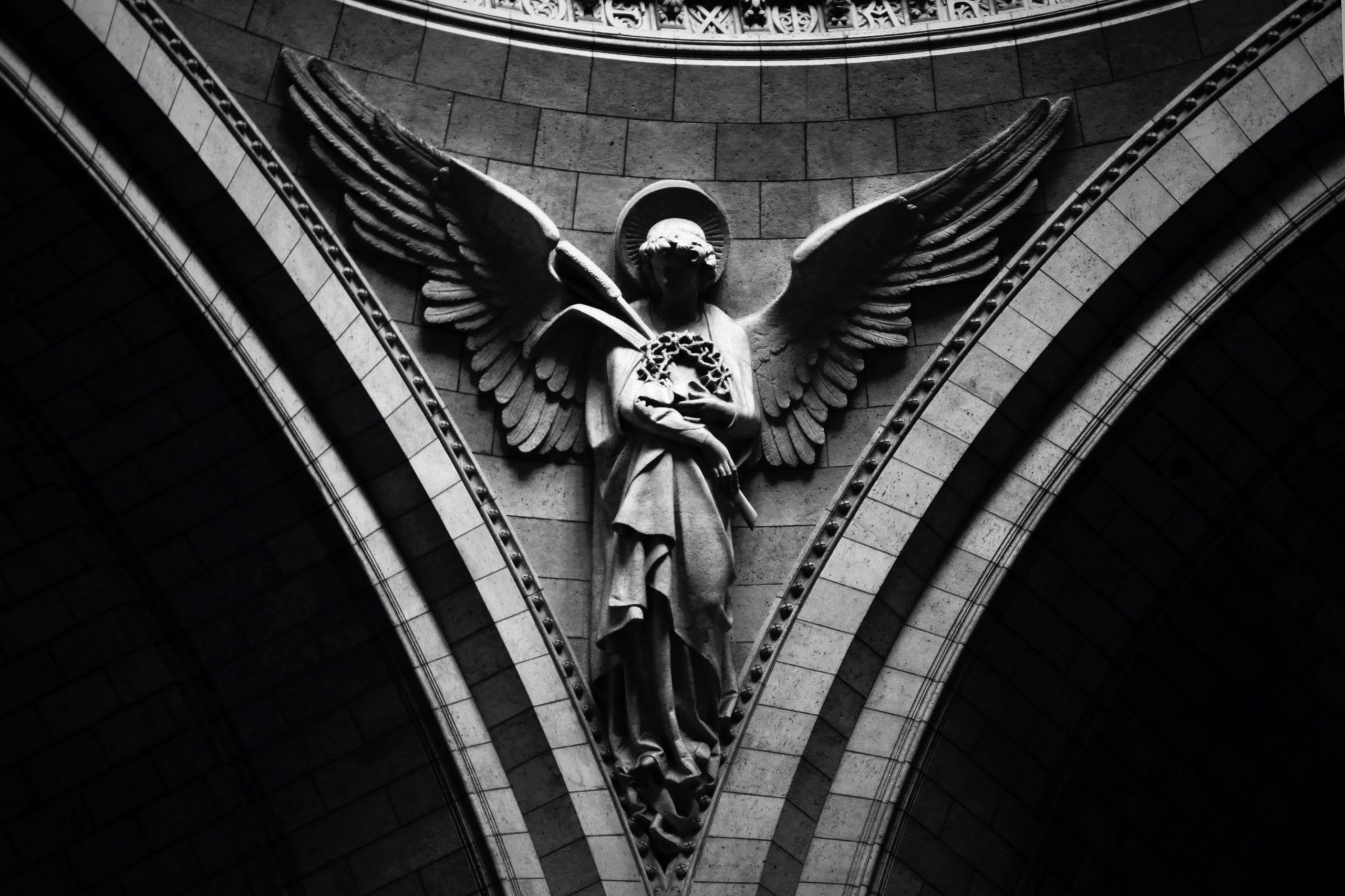 church decoration frieze sculpture angels wings spread