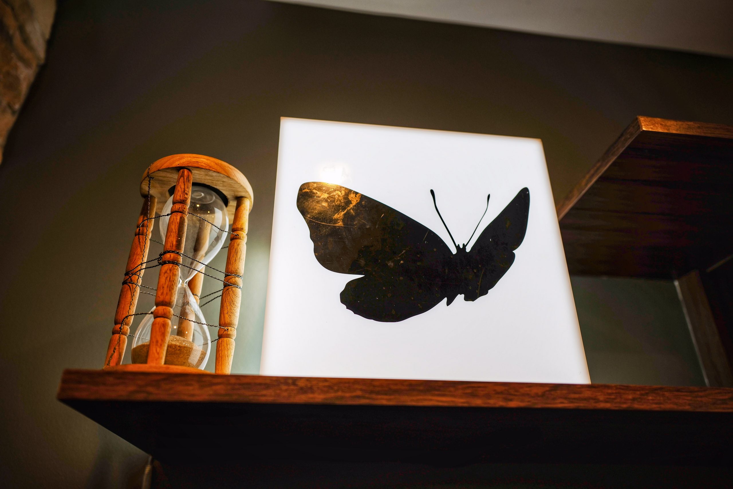 hourglass with butterfly