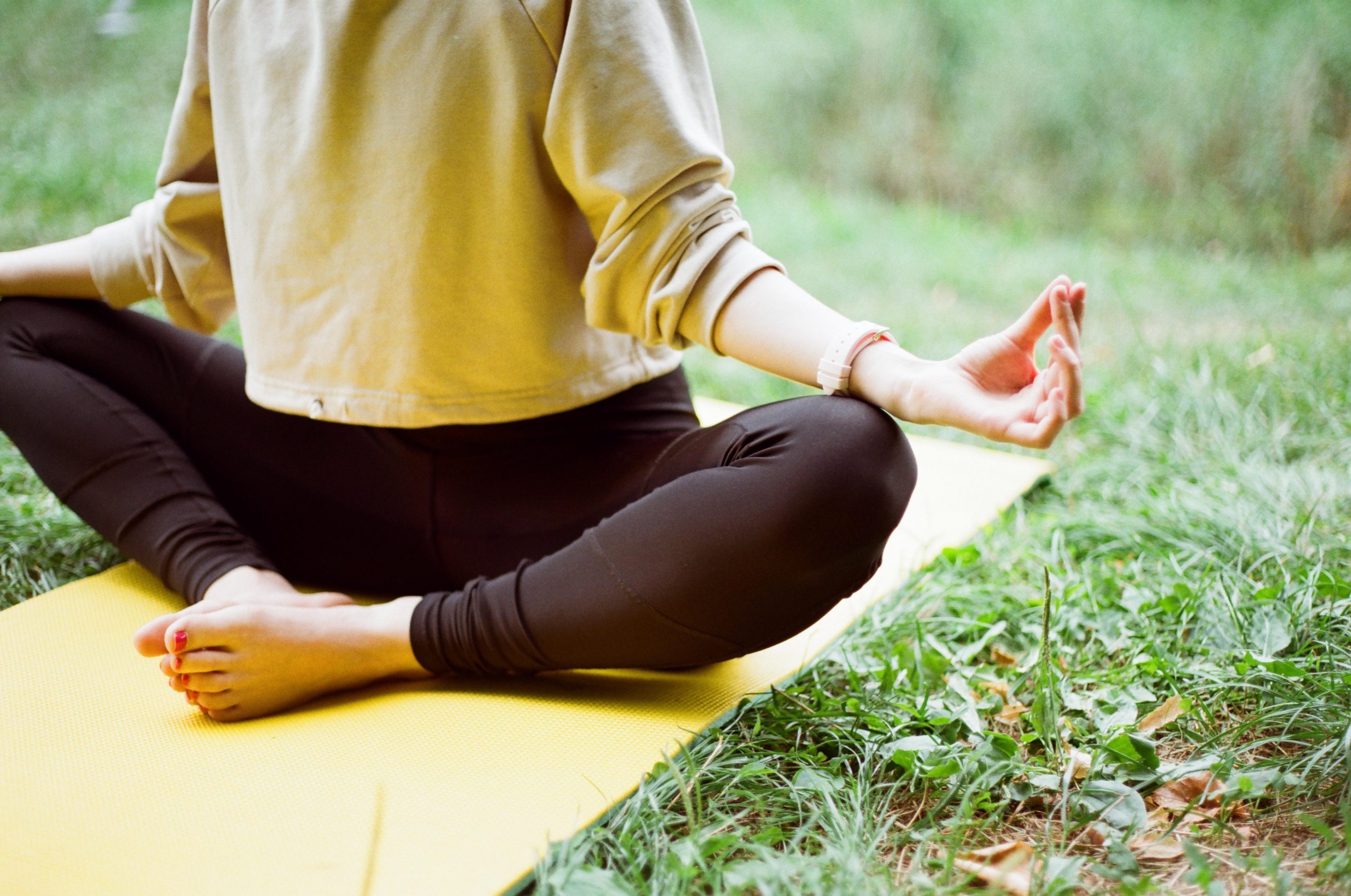 yin yoga butterfly pose outdoor yoga yellow yoga mat