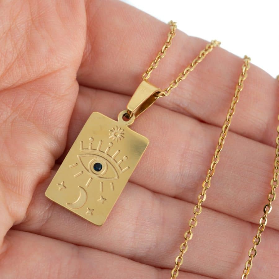 Eye of Horus day night moon sun gold amulet